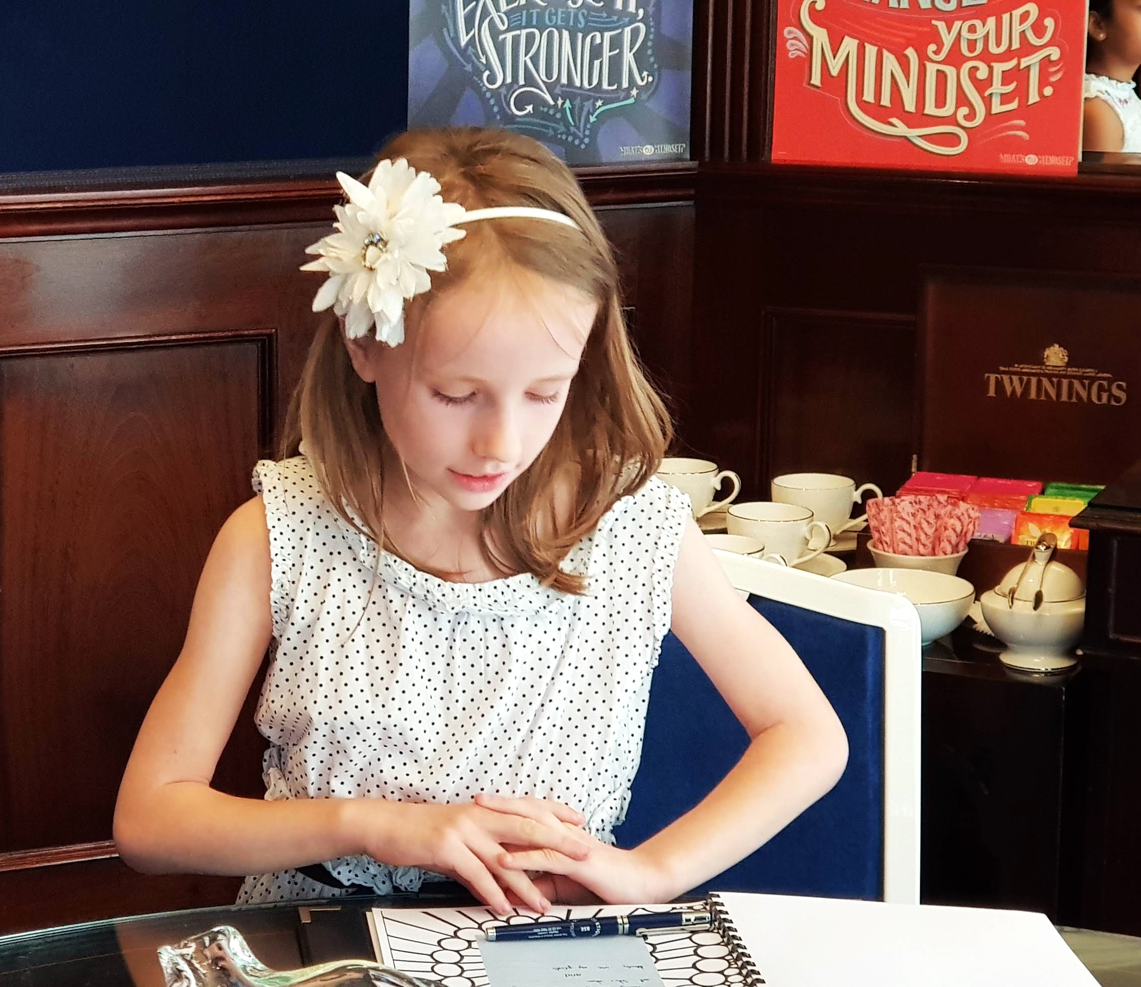 Child completing a leadership journal activity
