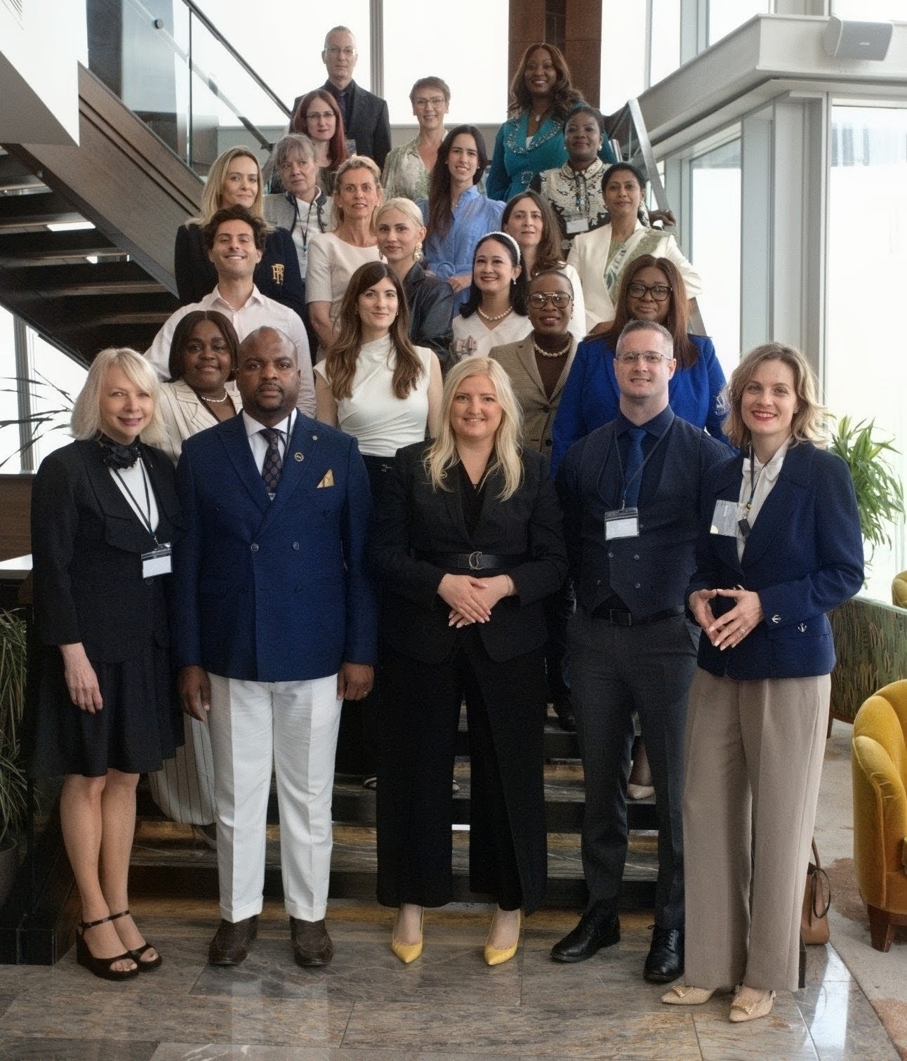 The British School of Excellence group on the stairs