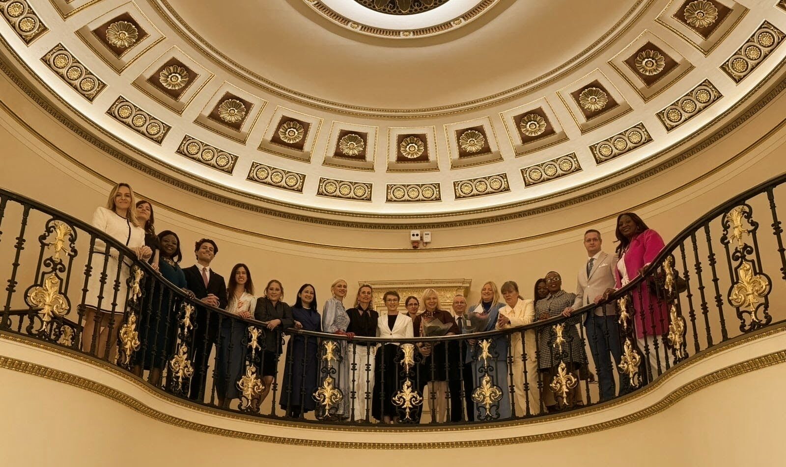 The cohort on the gallery staircase