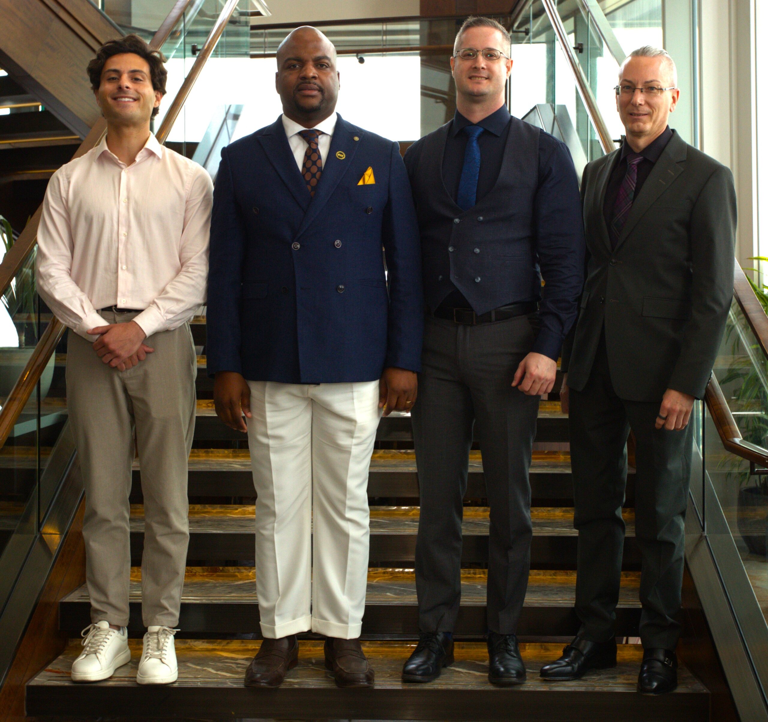 Male delegates on the staircase